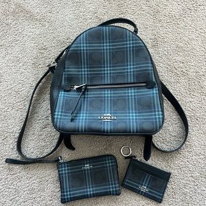 Coach Medium Backpack with wallet and cardholder.